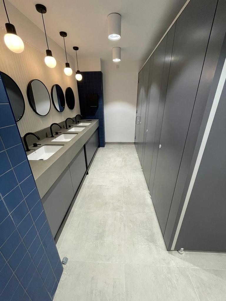 Unity ColourCoat toilet cubicles & Quartz Vanity unit